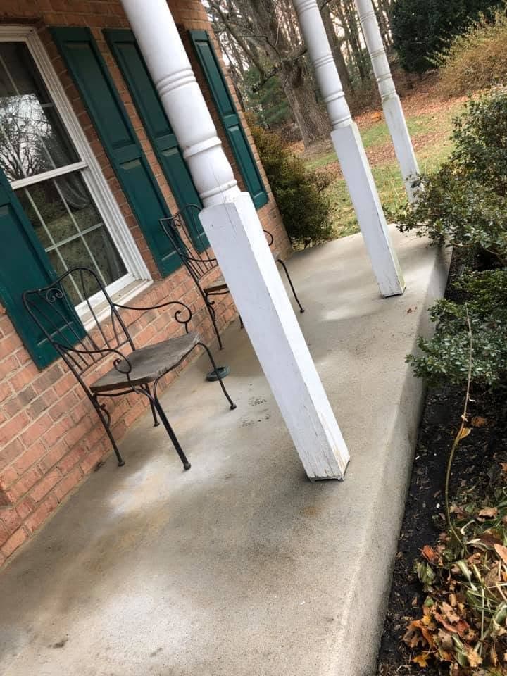 Clean front porch after Milani Landscaping restoration