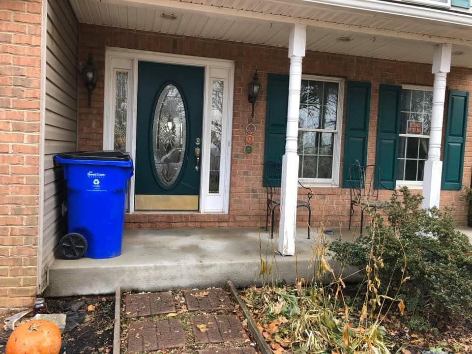 Weathered front porch before Milani Landscaping restoration
