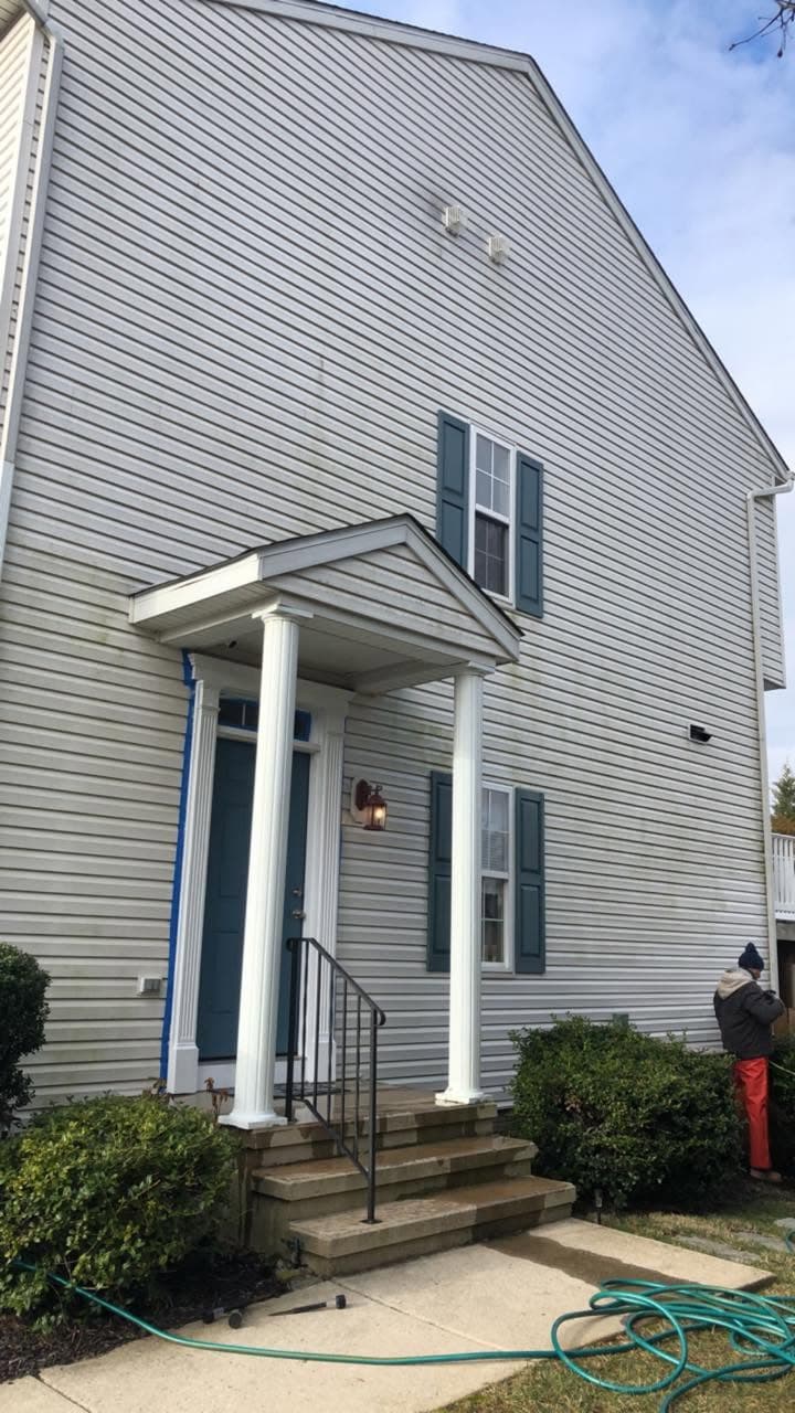 Cleaned home exterior after Milani Landscaping power washing